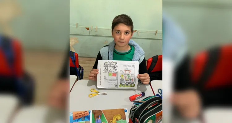 A turma realizou diversas propostas, como a elaboração de desenhos e a participação no tradicional festejo junino da escola.