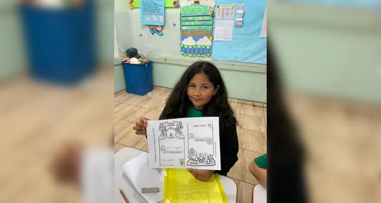 A turma realizou diversas propostas, como a elaboração de desenhos e a participação no tradicional festejo junino da escola.