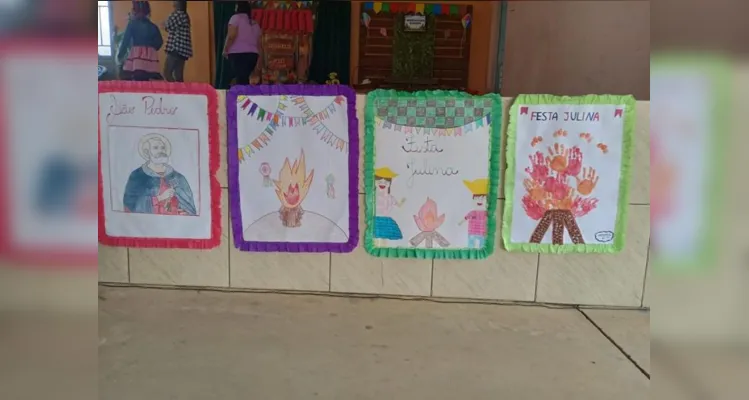 A turma realizou diversas propostas, como a elaboração de desenhos e a participação no tradicional festejo junino da escola.