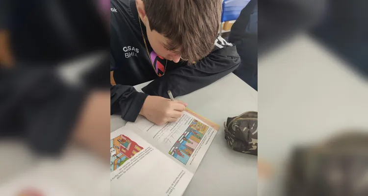 Uma cartilha didática também auxiliou os alunos em sala de aula.