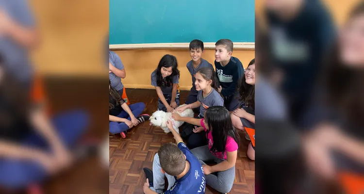 Confira os registros dos alunos com seus pets em sala e em casa.