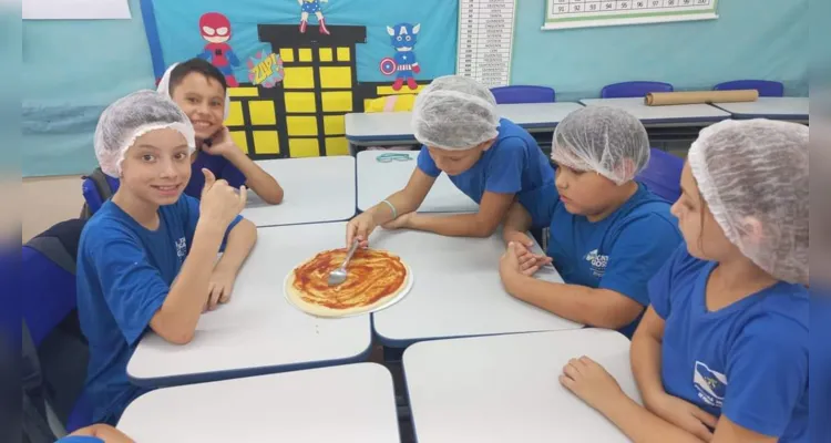 Trabalhando conceitos matemáticos, os alunos prepararam pizzas em sala de aula