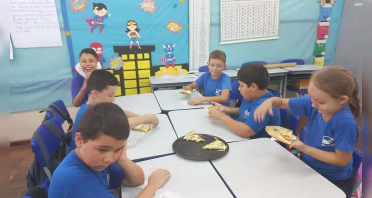 Trabalhando conceitos matemáticos, os alunos prepararam pizzas em sala de aula