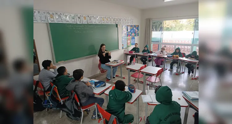 Veja alguns registros do trabalho 'monetário' em sala de aula.