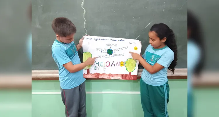 Confira os registros do trabalho ambiental em sala de aula.