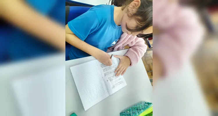 Um texto coletivo também foi organizado em sala.