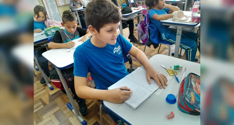 Um texto coletivo também foi organizado em sala.