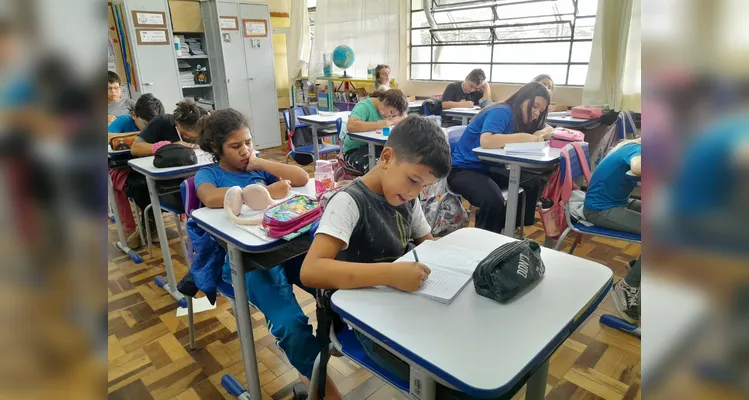 Um texto coletivo também foi organizado em sala.