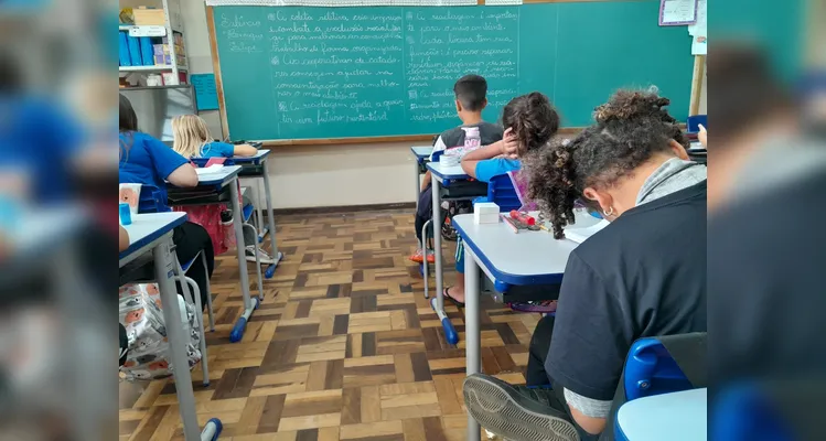 Um texto coletivo também foi organizado em sala.
