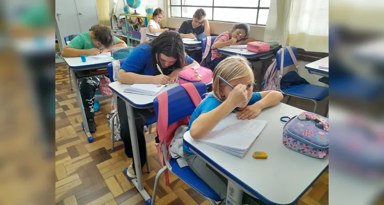 Um texto coletivo também foi organizado em sala.
