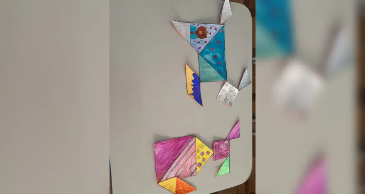 A turma também utilizou o Tangram para a confecção de desenhos.