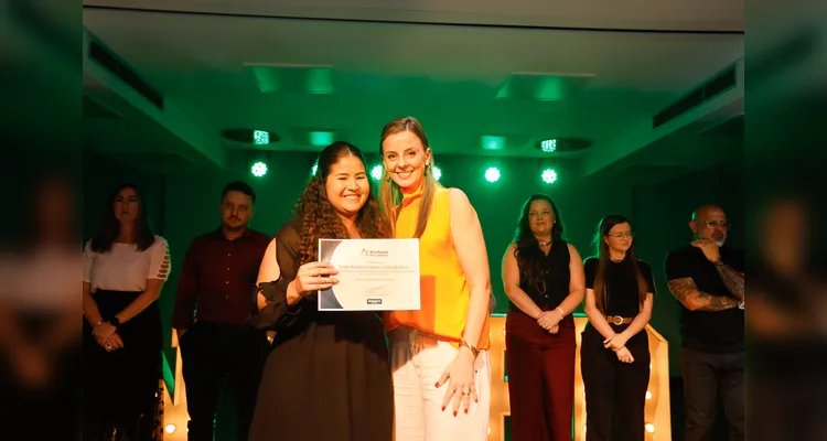 Formandos celebram o fortalecimento da liderança interna, que reforça a preparação da Unimed para o futuro