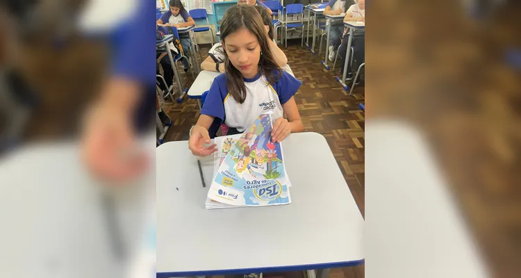 A classe realizou uma série de estudos e ações, entre elas a confecção de cartazes e a preparação de biscoitos.