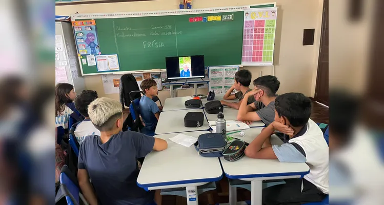 A classe realizou uma série de estudos e ações, entre elas a confecção de cartazes e a preparação de biscoitos.