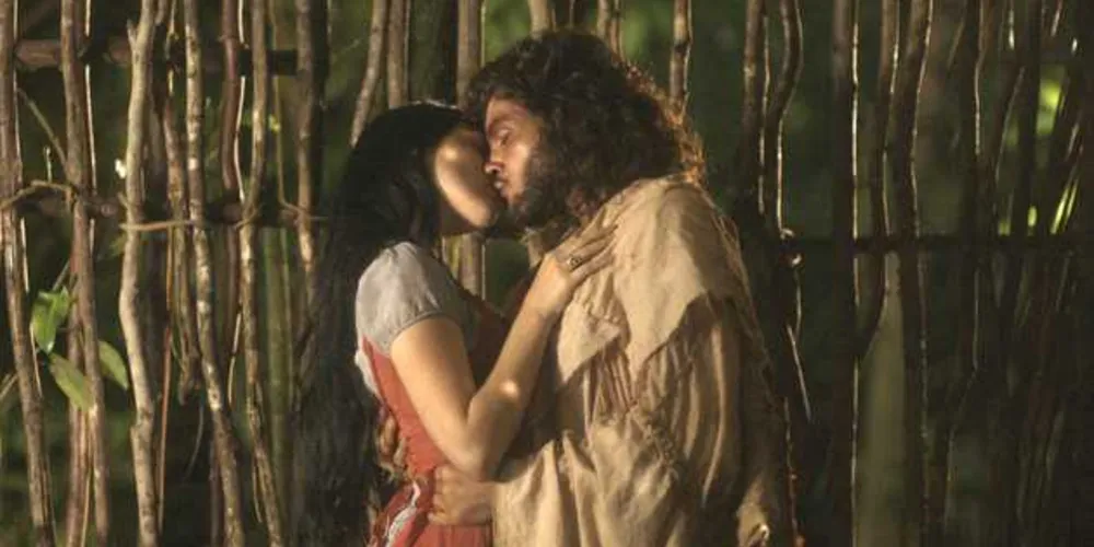 Imagem ilustrativa da imagem Novo Mundo: Anna e Joaquim se beijam