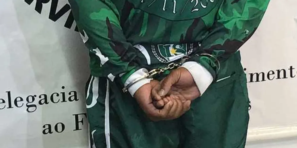 Suspeito de participar das agressões foi preso durante o jogo no meio da torcida do Coritiba | Divulgação/Sesp