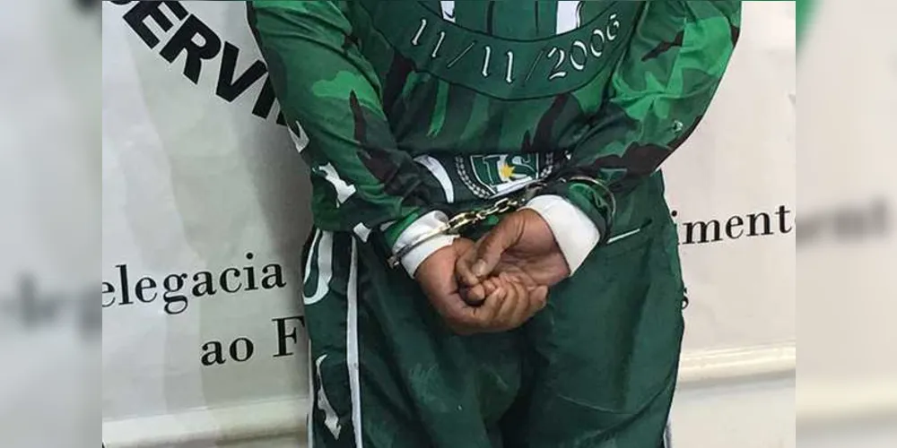 Suspeito de participar das agressões foi preso durante o jogo no meio da torcida do Coritiba | Divulgação/Sesp