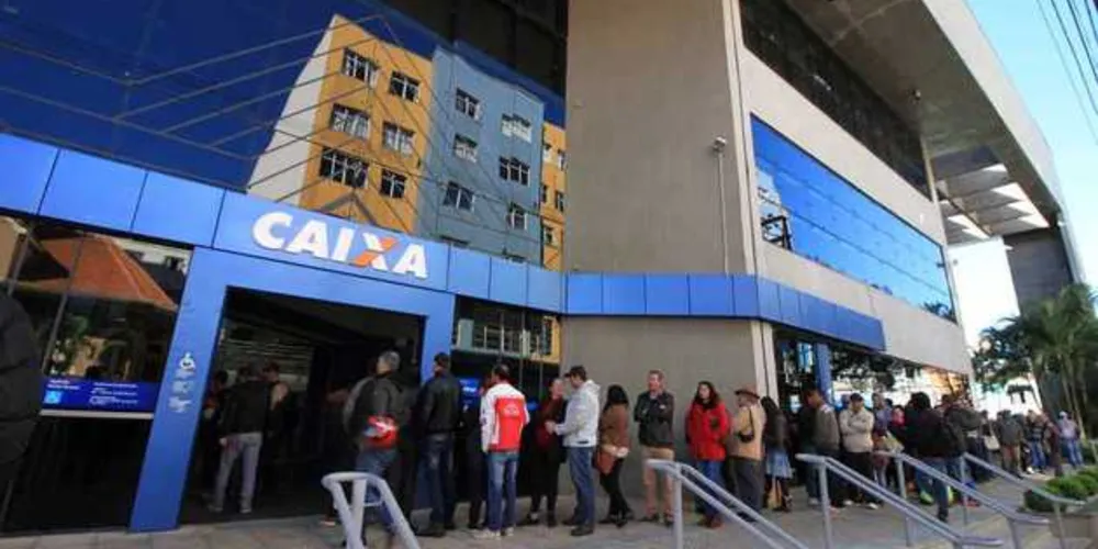 Imagem ilustrativa da imagem Caixa inicia pagamento de abono salarial nesta quinta