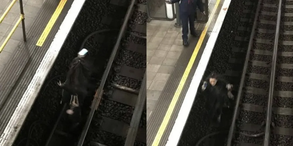 Mulher faz parte do Metro de Londres pausar por causa de celular/Foto: Divulgação Twitter 