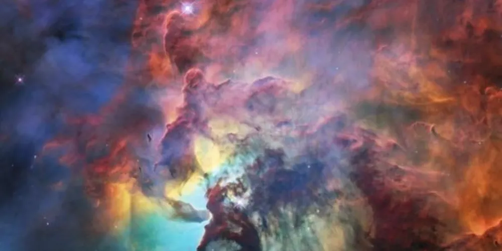 Nebulosa da Lagoa registrada na luz visível e no infravermelho/Foto: Reprodução NASA / ESA / STScl