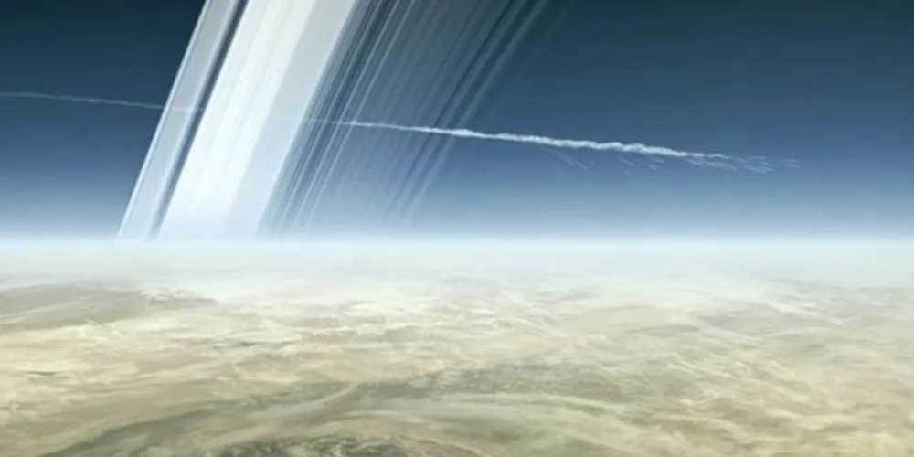Reprodução artística do momento em que a Sonda Cassini se desfragmentou na atmosfera de Saturno.
