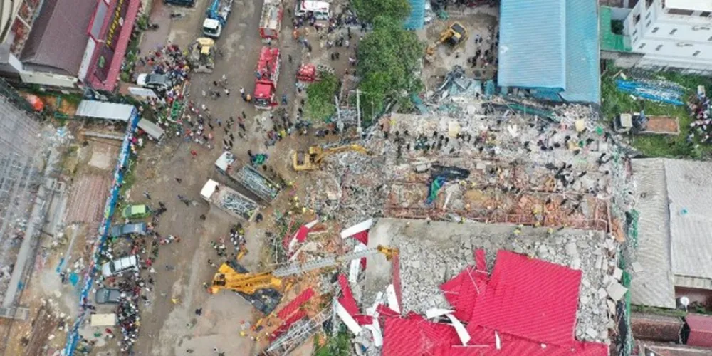 Imagem ilustrativa da imagem Queda de prédio no
Camboja mata ao menos 18 operários 