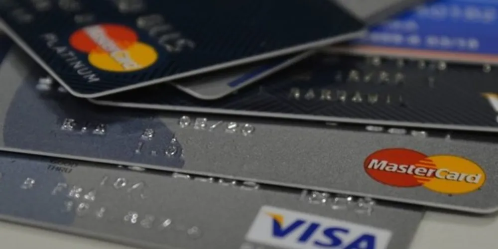 Desemprego e inflação impulsionam inadimplência 