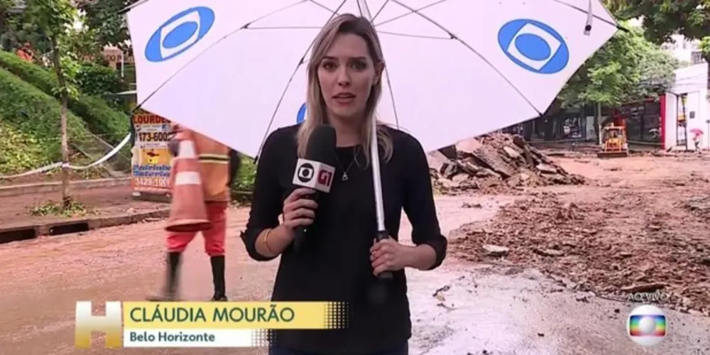 Imagem ilustrativa da imagem Repórter aparece segurando guarda-chuva no ‘Jornal Hoje’