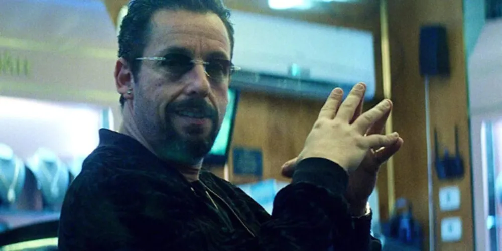 Em 'Joias Brutas', longa dirigido pelos irmãos, Sandler interpreta Howard Ratner, um dono de joalheria viciado em apostas
