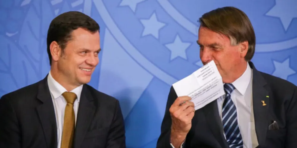 Anderson Torres, ex-ministro da Justiça ao lado do ex-presidente Jair Bolsonaro