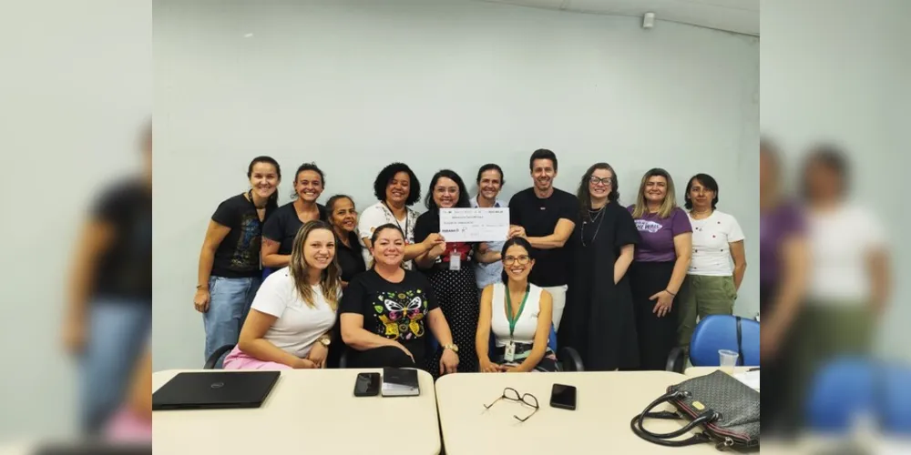 A entrega simbólica do cheque foi feita pela presidente do CMDM, Bruna Javorski, durante a última reunião ordinária do ano