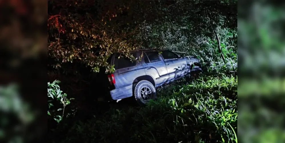 Havia uma garrafa de vodca vazia embaixo de um dos bancos do carro