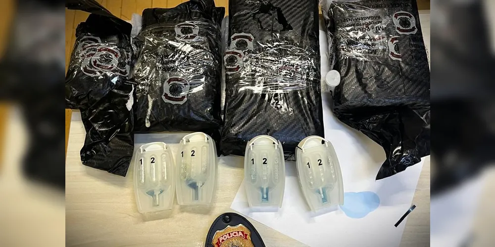 Droga estava escondida em compartimento oculto na mala