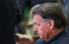 Impedido por tornozeleira, Bolsonaro assiste ato por videochamada