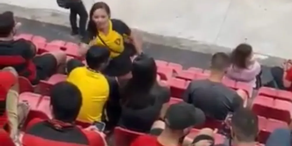 Mulher flagra suposta traição durante jogo