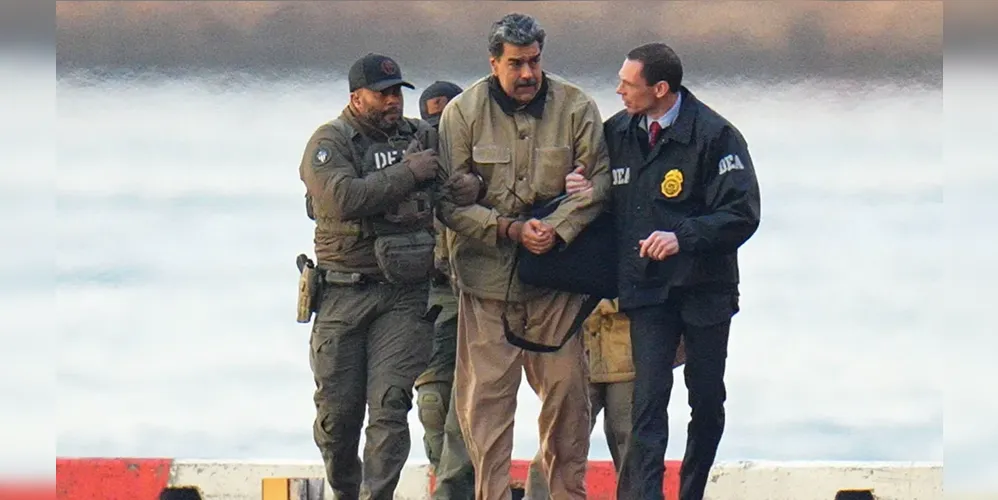 Na imagem, Maduro aparece com uniforme de presidiário