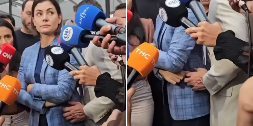 Michelle Bolsonaro em entrevista no momento em que homem passa a mão