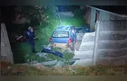Condutor quebra muro de casa e foge para área de mata durante perseguição em PG