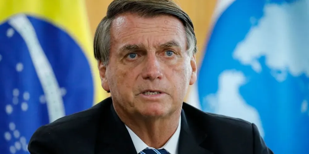 O então presidente Jair Bolsonaro em audiência com o secretário-geral da OCDE