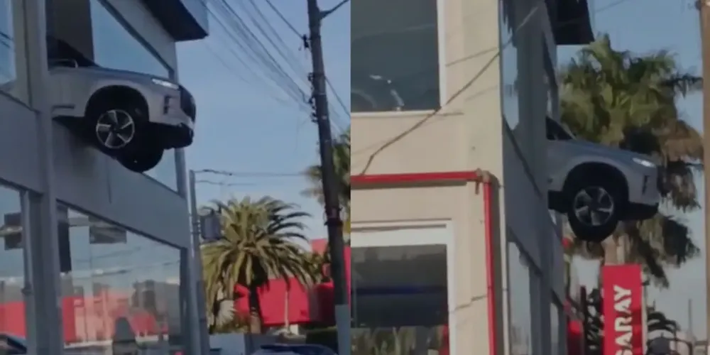 Carro fica pendurado em segundo andar de concessionária em Porto Alegre