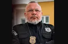 Policial é morto com tiro na cabeça após briga por batidas em portão