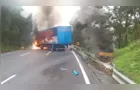 Carreta cai em ribanceira e incêndio em veículos interdita BR-116