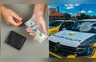 Você devolveria? Mulher encontra carteira com US$ 1 mil e chama a PM em PG