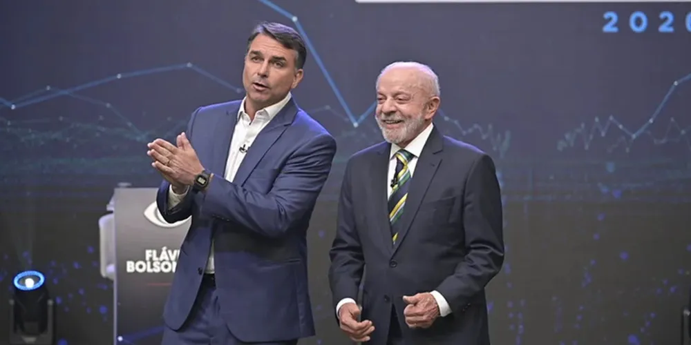 Flávio Bolsonaro e Lula no debate da Band