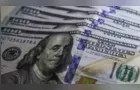 Dólar cai para R$ 5,01 com exterior e expectativa eleitoral no Brasil