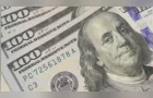 Dólar cai a R$ 5, e bolsa sobe quase 8% após primeiro turno