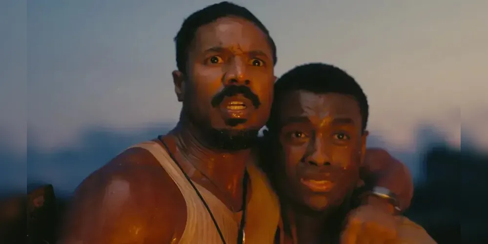 Michael B. Jordan e Miles Caton em "Pecadores"