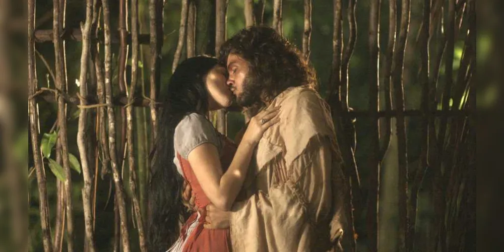 Imagem ilustrativa da imagem Novo Mundo: Anna e Joaquim se beijam