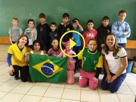Imagem ilustrativa da imagem Alunos gravam vídeos na estreia da Seleção na Copa