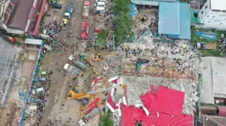 Imagem ilustrativa da imagem Queda de prédio no
Camboja mata ao menos 18 operários 